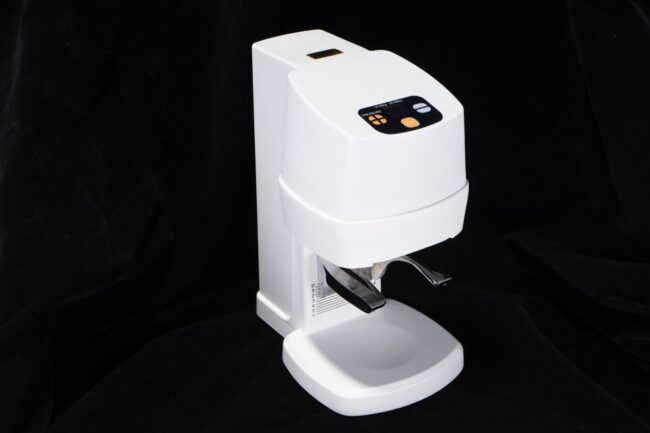 Automatic coffee tamper machine